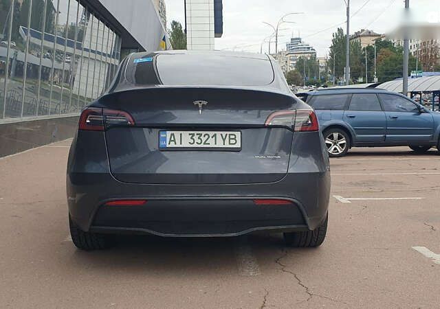 Сірий Тесла Model Y, об'ємом двигуна 0 л та пробігом 84 тис. км за 27900 $, фото 6 на Automoto.ua
