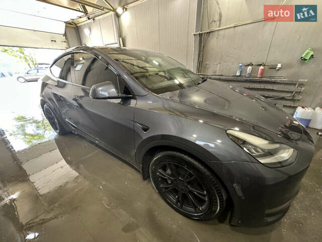 Серый Тесла Model Y, объемом двигателя 0 л и пробегом 55 тыс. км за 29000 $, фото 7 на Automoto.ua