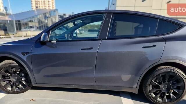 Серый Тесла Model Y, объемом двигателя 0 л и пробегом 76 тыс. км за 29700 $, фото 2 на Automoto.ua