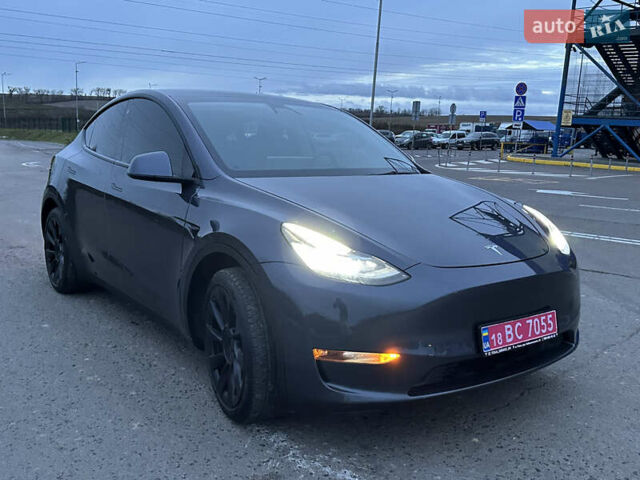 Серый Тесла Model Y, объемом двигателя 0 л и пробегом 110 тыс. км за 23700 $, фото 1 на Automoto.ua