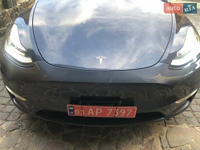 Серый Тесла Model Y, объемом двигателя 0 л и пробегом 77 тыс. км за 22700 $, фото 3 на Automoto.ua