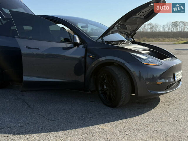 Серый Тесла Model Y, объемом двигателя 0 л и пробегом 44 тыс. км за 26000 $, фото 22 на Automoto.ua