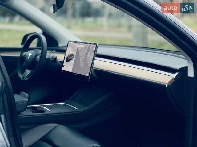 Серый Тесла Model Y, объемом двигателя 0 л и пробегом 92 тыс. км за 24499 $, фото 9 на Automoto.ua