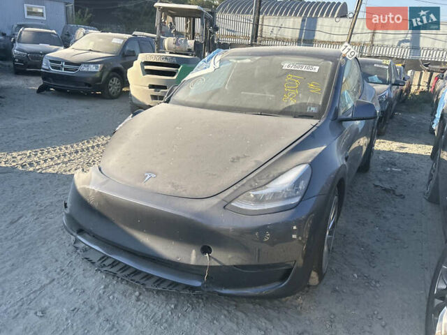 Серый Тесла Model Y, объемом двигателя 0 л и пробегом 81 тыс. км за 17500 $, фото 15 на Automoto.ua