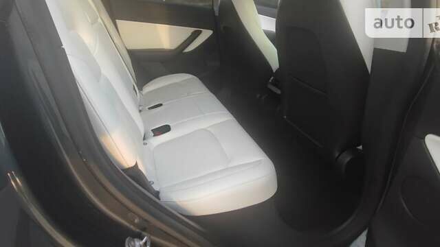 Сірий Тесла Model Y, об'ємом двигуна 0 л та пробігом 81 тис. км за 21499 $, фото 13 на Automoto.ua