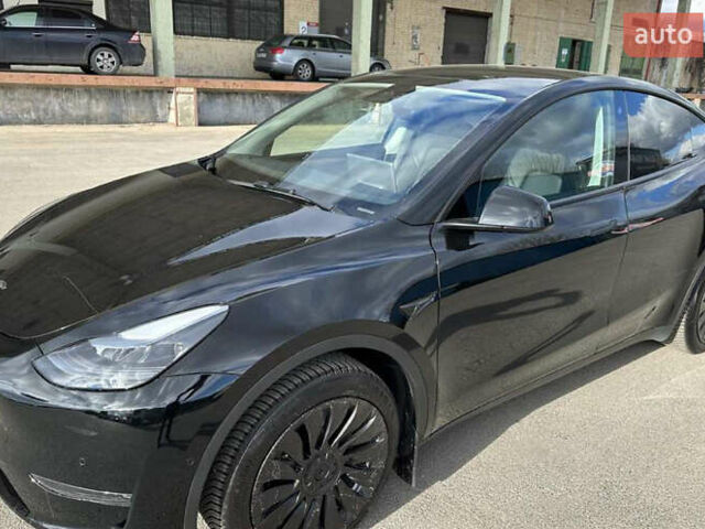 Серый Тесла Model Y, объемом двигателя 0 л и пробегом 30 тыс. км за 28000 $, фото 1 на Automoto.ua