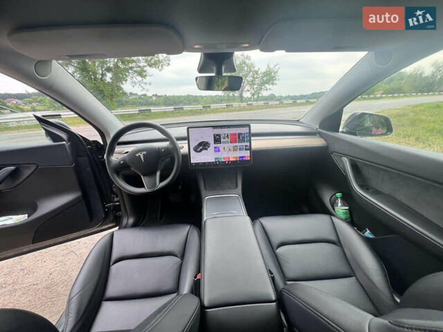 Серый Тесла Model Y, объемом двигателя 0 л и пробегом 61 тыс. км за 29000 $, фото 7 на Automoto.ua