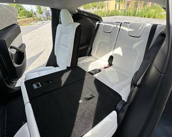 Серый Тесла Model Y, объемом двигателя 0 л и пробегом 74 тыс. км за 27800 $, фото 11 на Automoto.ua