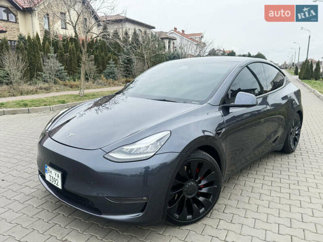 Серый Тесла Model Y, объемом двигателя 0 л и пробегом 26 тыс. км за 29000 $, фото 2 на Automoto.ua