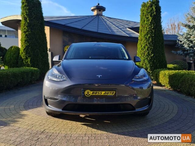 Серый Тесла Model Y, объемом двигателя 65 л и пробегом 80 тыс. км за 31800 $, фото 1 на Automoto.ua
