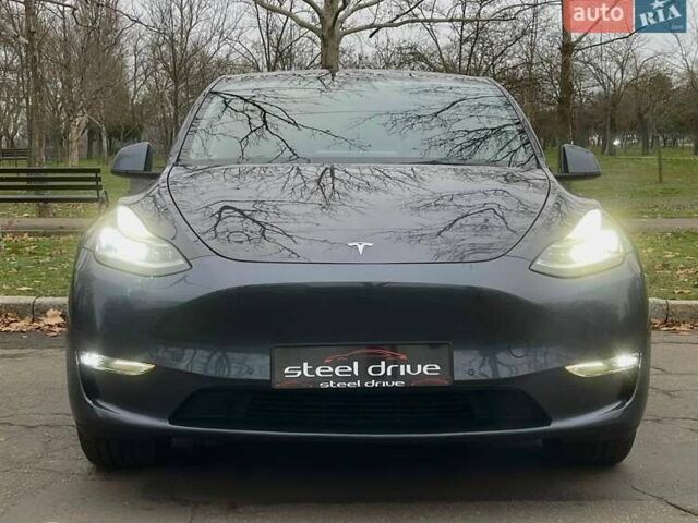 Серый Тесла Model Y, объемом двигателя 0 л и пробегом 92 тыс. км за 24499 $, фото 1 на Automoto.ua