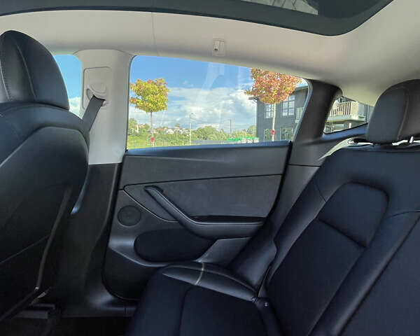 Серый Тесла Model Y, объемом двигателя 0 л и пробегом 69 тыс. км за 24100 $, фото 22 на Automoto.ua