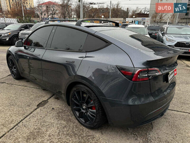 Серый Тесла Model Y, объемом двигателя 0 л и пробегом 98 тыс. км за 29490 $, фото 3 на Automoto.ua