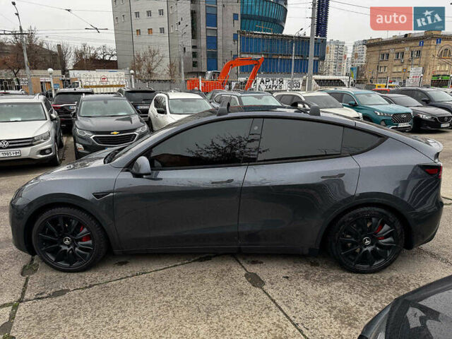 Серый Тесла Model Y, объемом двигателя 0 л и пробегом 98 тыс. км за 29490 $, фото 2 на Automoto.ua