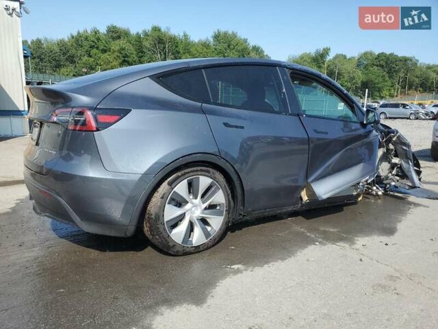 Серый Тесла Model Y, объемом двигателя 0 л и пробегом 81 тыс. км за 17500 $, фото 2 на Automoto.ua
