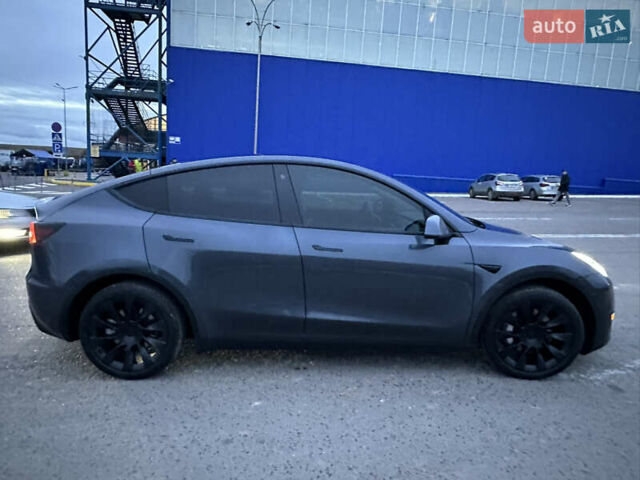 Серый Тесла Model Y, объемом двигателя 0 л и пробегом 110 тыс. км за 23700 $, фото 2 на Automoto.ua