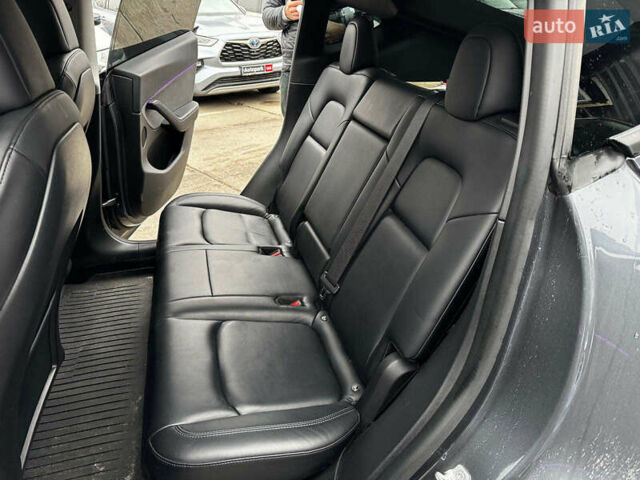 Серый Тесла Model Y, объемом двигателя 0 л и пробегом 98 тыс. км за 29490 $, фото 20 на Automoto.ua