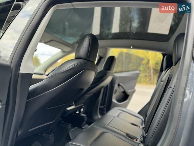 Серый Тесла Model Y, объемом двигателя 0 л и пробегом 211 тыс. км за 18950 $, фото 42 на Automoto.ua