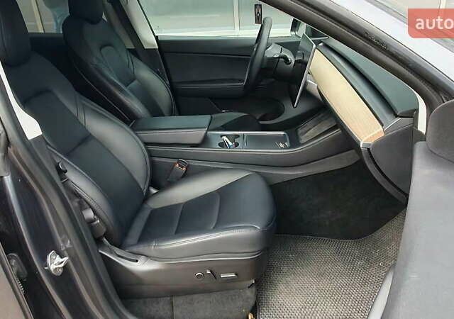 Серый Тесла Model Y, объемом двигателя 0 л и пробегом 84 тыс. км за 24999 $, фото 34 на Automoto.ua