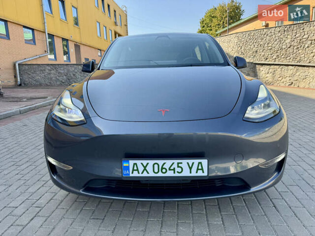 Серый Тесла Model Y, объемом двигателя 0 л и пробегом 107 тыс. км за 29800 $, фото 1 на Automoto.ua