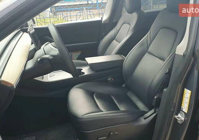 Серый Тесла Model Y, объемом двигателя 0 л и пробегом 84 тыс. км за 24999 $, фото 21 на Automoto.ua