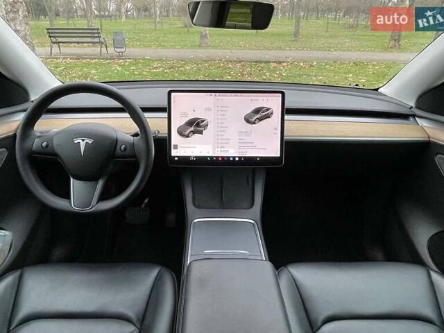 Серый Тесла Model Y, объемом двигателя 0 л и пробегом 92 тыс. км за 24499 $, фото 10 на Automoto.ua