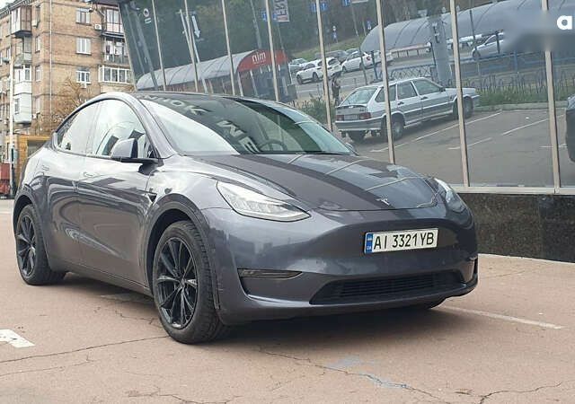 Сірий Тесла Model Y, об'ємом двигуна 0 л та пробігом 84 тис. км за 27900 $, фото 1 на Automoto.ua