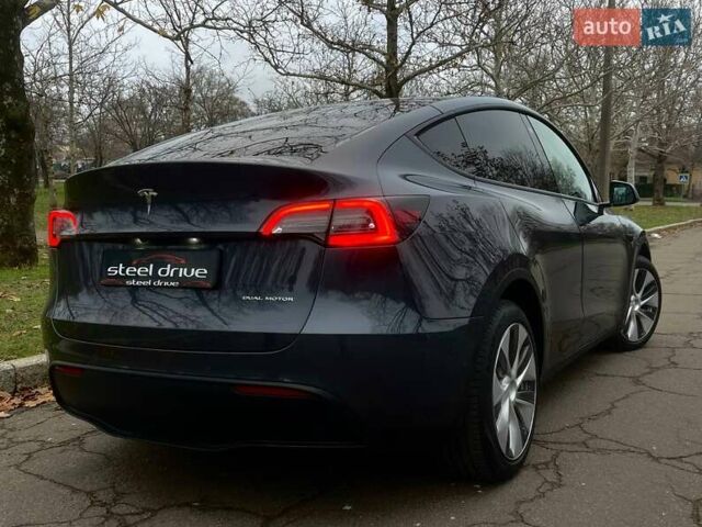 Серый Тесла Model Y, объемом двигателя 0 л и пробегом 92 тыс. км за 24499 $, фото 4 на Automoto.ua