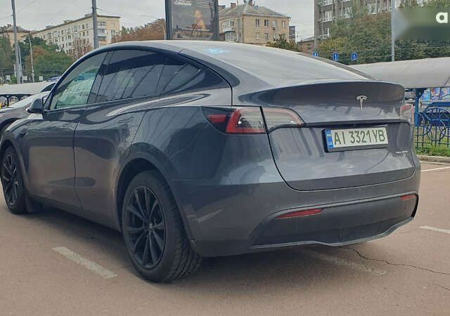 Сірий Тесла Model Y, об'ємом двигуна 0 л та пробігом 84 тис. км за 27900 $, фото 5 на Automoto.ua