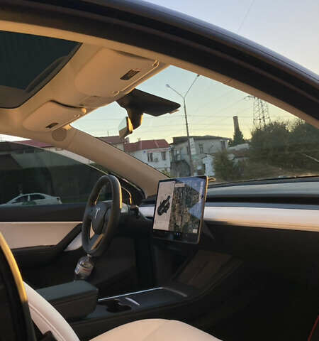 Серый Тесла Model Y, объемом двигателя 0 л и пробегом 98 тыс. км за 25300 $, фото 7 на Automoto.ua