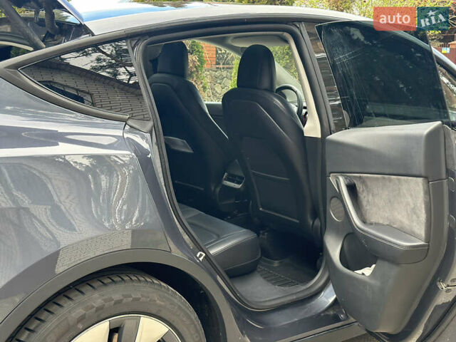 Серый Тесла Model Y, объемом двигателя 0 л и пробегом 88 тыс. км за 23500 $, фото 5 на Automoto.ua