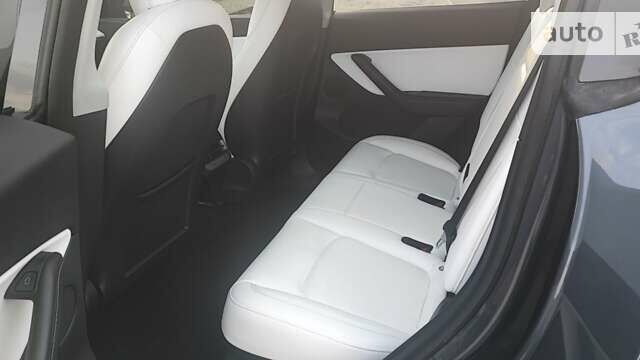 Серый Тесла Model Y, объемом двигателя 0 л и пробегом 61 тыс. км за 22900 $, фото 12 на Automoto.ua