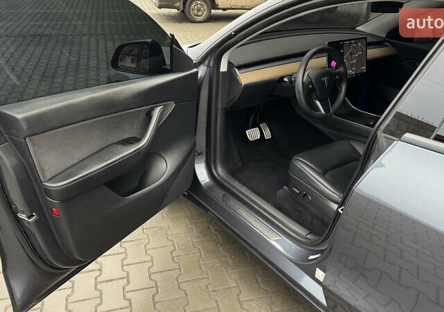 Серый Тесла Model Y, объемом двигателя 0 л и пробегом 138 тыс. км за 20200 $, фото 20 на Automoto.ua