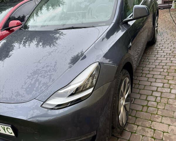 Серый Тесла Model Y, объемом двигателя 0 л и пробегом 85 тыс. км за 23000 $, фото 1 на Automoto.ua