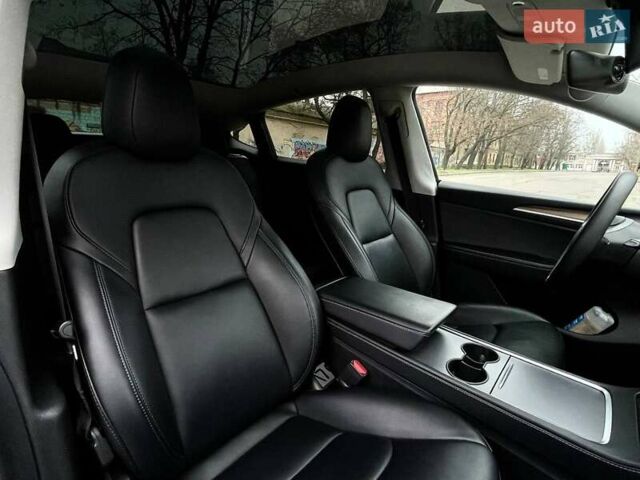 Серый Тесла Model Y, объемом двигателя 0 л и пробегом 92 тыс. км за 24499 $, фото 13 на Automoto.ua