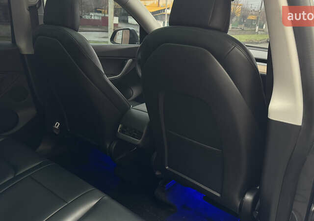 Серый Тесла Model Y, объемом двигателя 0 л и пробегом 138 тыс. км за 20200 $, фото 34 на Automoto.ua