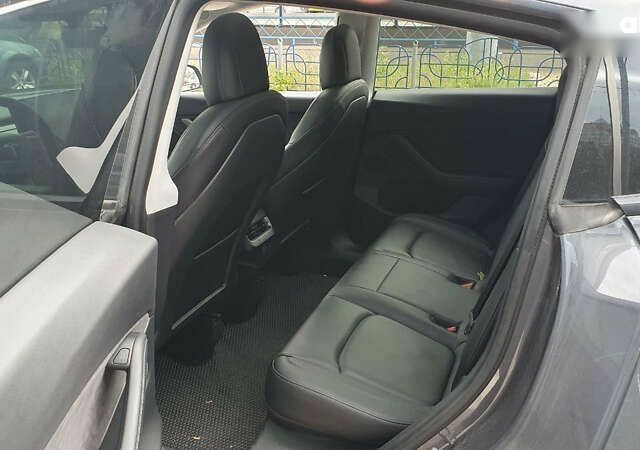 Сірий Тесла Model Y, об'ємом двигуна 0 л та пробігом 84 тис. км за 27900 $, фото 14 на Automoto.ua