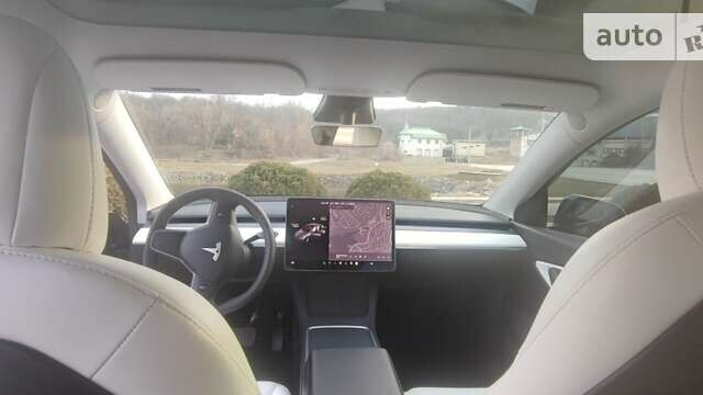 Серый Тесла Model Y, объемом двигателя 0 л и пробегом 61 тыс. км за 22900 $, фото 15 на Automoto.ua