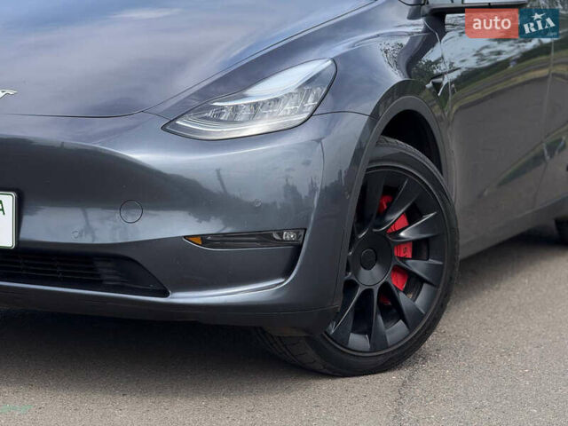 Серый Тесла Model Y, объемом двигателя 0 л и пробегом 91 тыс. км за 26500 $, фото 4 на Automoto.ua