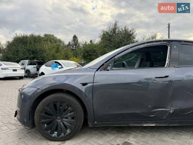 Серый Тесла Model Y, объемом двигателя 0 л и пробегом 102 тыс. км за 18200 $, фото 3 на Automoto.ua