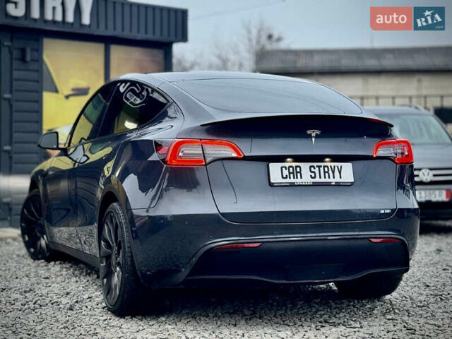 Серый Тесла Model Y, объемом двигателя 0 л и пробегом 107 тыс. км за 23999 $, фото 2 на Automoto.ua