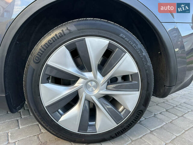 Сірий Тесла Model Y, об'ємом двигуна 0 л та пробігом 52 тис. км за 23499 $, фото 13 на Automoto.ua