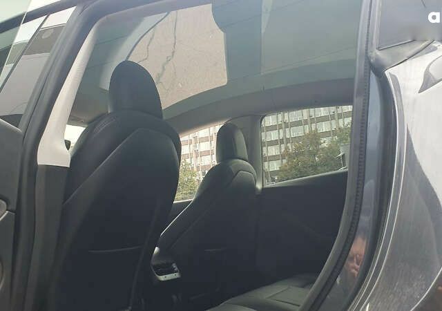 Сірий Тесла Model Y, об'ємом двигуна 0 л та пробігом 84 тис. км за 27900 $, фото 15 на Automoto.ua