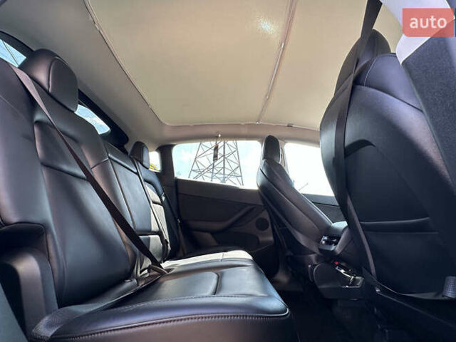 Серый Тесла Model Y, объемом двигателя 0 л и пробегом 68 тыс. км за 25500 $, фото 21 на Automoto.ua