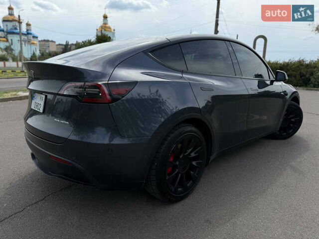 Серый Тесла Model Y, объемом двигателя 0 л и пробегом 91 тыс. км за 26500 $, фото 20 на Automoto.ua