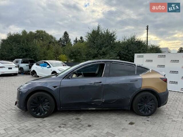 Серый Тесла Model Y, объемом двигателя 0 л и пробегом 102 тыс. км за 18200 $, фото 1 на Automoto.ua