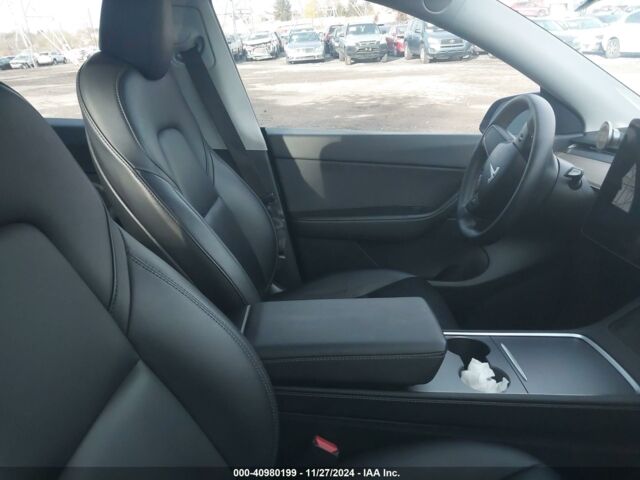 Серый Тесла Model Y, объемом двигателя 0 л и пробегом 0 тыс. км за 18300 $, фото 6 на Automoto.ua