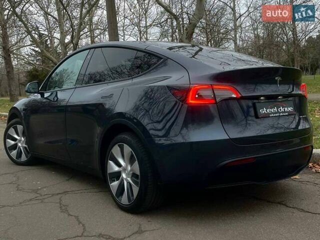 Серый Тесла Model Y, объемом двигателя 0 л и пробегом 92 тыс. км за 24499 $, фото 6 на Automoto.ua