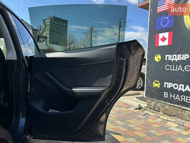 Серый Тесла Model Y, объемом двигателя 0 л и пробегом 68 тыс. км за 25500 $, фото 20 на Automoto.ua