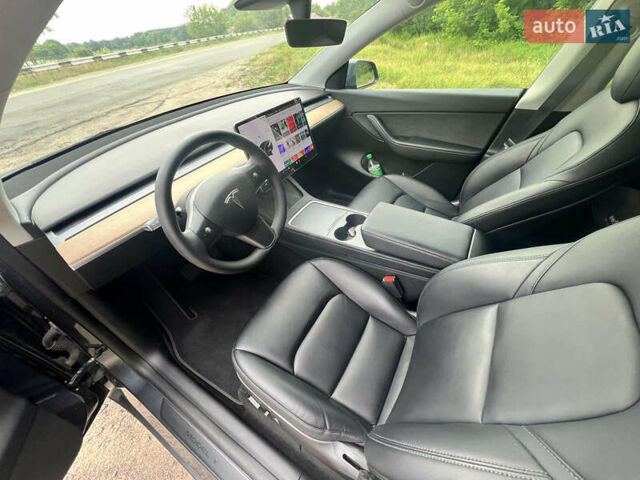 Серый Тесла Model Y, объемом двигателя 0 л и пробегом 61 тыс. км за 29000 $, фото 6 на Automoto.ua